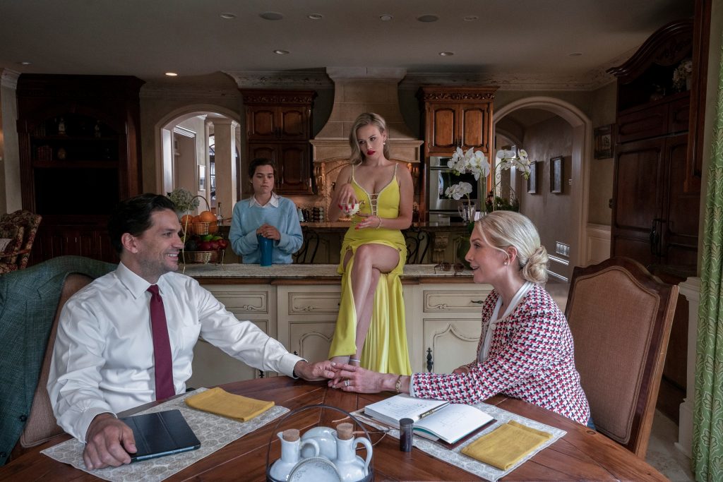 First Kill. (L to R) Will Swenson as Sebastian Fairmont, Sarah Catherine Hook as Juliette, Gracie Dzienny as Elinor Fairmont, Elizabeth Mitchell as Margot Fairmont in episode 101 of First Kill. Cr. Brian Douglas/Netflix © 2022